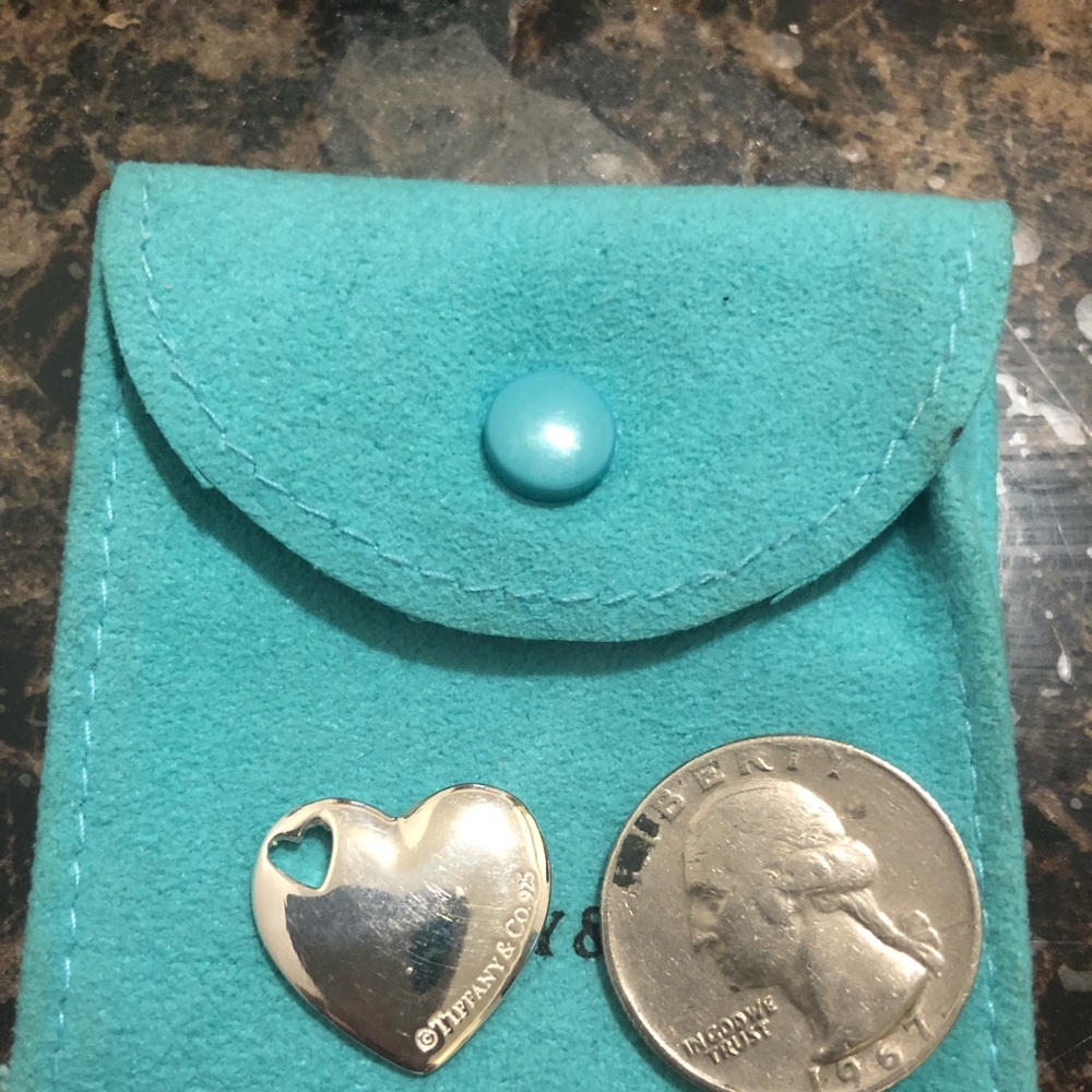 Tiffany&co sterling silver heart pendant excelente condition has been cl…